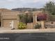 Charming single-story home with lush landscaping and a convenient two-car garage at 11052 N 10Th Pl, Phoenix, AZ 85020