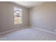 Cozy bedroom with plush carpeting and window with views at 11300 N Casa Dega Dr # 1081, Surprise, AZ 85388