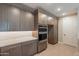 Modern kitchen showcasing sleek cabinets, stainless steel appliances, and a stylish countertop at 11300 N Casa Dega Dr # 1081, Surprise, AZ 85388