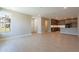 Open-concept living room and kitchen area featuring modern finishes and plenty of natural light at 11300 N Casa Dega Dr # 1081, Surprise, AZ 85388