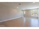 Inviting living room featuring wood flooring, neutral walls and ample natural light at 11300 N Casa Dega Dr # 1081, Surprise, AZ 85388