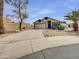 Charming single-story home with desert landscaping, a two-car garage, and a paved driveway at 1211 S Pueblo Ct, Gilbert, AZ 85233