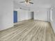 Bright, open-concept living area with modern flooring and plenty of natural light at 1211 S Pueblo Ct, Gilbert, AZ 85233