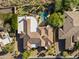 Expansive estate featuring a private pool, putting green, and lush landscaping, offering luxurious outdoor living at 13249 E Summit Dr, Scottsdale, AZ 85259