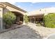 Spacious outdoor patio with lush landscaping and an inviting entertainment area at 13249 E Summit Dr, Scottsdale, AZ 85259