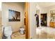 Well-appointed bathroom featuring neutral colors and an adjacent hallway leading to additional rooms for easy access at 13249 E Summit Dr, Scottsdale, AZ 85259