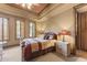 Comfortable bedroom with natural light, carpet, and traditional furnishings at 13249 E Summit Dr, Scottsdale, AZ 85259