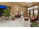 Spacious covered patio with elegant seating, offering seamless indoor-outdoor living and entertaining at 13249 E Summit Dr, Scottsdale, AZ 85259