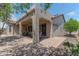 A covered patio with brick flooring, perfect for outdoor entertaining and relaxing at 15353 W Cheery Lynn Rd, Goodyear, AZ 85395