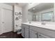 Bright bathroom features double sinks, modern fixtures, and private commode at 1647 W Gold Mine Way, San Tan Valley, AZ 85144