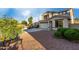 Attractive two-story home featuring a desert landscaped front yard and a spacious two-car garage at 1647 W Gold Mine Way, San Tan Valley, AZ 85144