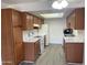 Bright kitchen featuring wood cabinets, modern appliances, and marble-style countertops offering ample counter space at 16602 N 25Th St # 123, Phoenix, AZ 85032