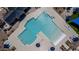 Aerial view of the community pool area with sun loungers and shades, perfect for a relaxing day at 17812 W Luke Ave, Litchfield Park, AZ 85340