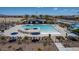 Community pool featuring a zero entry and plenty of seating at 17812 W Luke Ave, Litchfield Park, AZ 85340