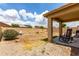 The spacious backyard features a covered patio, ideal for enjoying outdoor leisure at 18102 E El Viejo Desierto --, Gold Canyon, AZ 85118