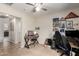 Neutral toned bedroom with hardwood floors, ceiling fan, desk, and chair at 18102 E El Viejo Desierto --, Gold Canyon, AZ 85118