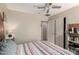 A bedroom with a queen-size bed, ceiling fan, and closet, providing a cozy and functional living space at 18102 E El Viejo Desierto --, Gold Canyon, AZ 85118