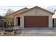 Single-story home features desert landscaping, a two-car garage, and a neutral-colored exterior at 18102 E El Viejo Desierto --, Gold Canyon, AZ 85118