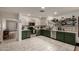 Updated kitchen with stainless steel appliances and dark green cabinetry at 18102 E El Viejo Desierto --, Gold Canyon, AZ 85118