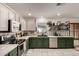 Well-lit kitchen featuring stainless steel appliances and dark green cabinetry at 18102 E El Viejo Desierto --, Gold Canyon, AZ 85118