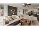 Spacious living room with dark accent wall and large sectional sofa at 18102 E El Viejo Desierto --, Gold Canyon, AZ 85118