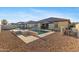 Beautifully landscaped backyard featuring a pool, spa, gazebo, and a relaxing seating area at 18387 W Mountain Sky Ave, Goodyear, AZ 85338