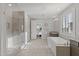 Spacious bathroom with double sinks, soaking tub and glass shower at 18387 W Mountain Sky Ave, Goodyear, AZ 85338