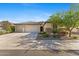 Charming home featuring a three-car garage and well-maintained landscaping at 18387 W Mountain Sky Ave, Goodyear, AZ 85338