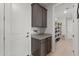 Hallway with cabinets, drawers, and pantry at 18387 W Mountain Sky Ave, Goodyear, AZ 85338