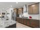 Stylish kitchen with subway tile backsplash, stainless steel appliances, and granite countertops at 18387 W Mountain Sky Ave, Goodyear, AZ 85338