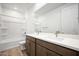 Bright bathroom with double sink vanity, bathtub and shower at 18522 W Mohave St, Goodyear, AZ 85338