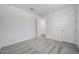 Bedroom with neutral carpet, white walls, and recessed lighting at 18522 W Mohave St, Goodyear, AZ 85338