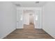Bright office space with wood-look tile and glass French doors at 18522 W Mohave St, Goodyear, AZ 85338