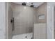 Large walk-in shower with sleek gray tile, dual shower heads, and a built-in niche at 2501 E Campbell Ave, Phoenix, AZ 85016