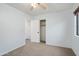 Bedroom with ceiling fan, window, and closet at 2717 N 107Th Dr, Avondale, AZ 85392