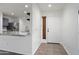 Inviting entryway with tile flooring that leads into the living area, showcasing the home's open layout at 2717 N 107Th Dr, Avondale, AZ 85392