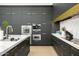 Modern kitchen featuring stainless steel appliances, quartz countertops, and ample cabinet space at 28754 N 107Th St, Scottsdale, AZ 85262