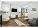Modern living room with stylish furniture, balcony access, and bright natural light at 28754 N 107Th St, Scottsdale, AZ 85262