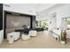 Expansive living space showcasing a modern design with large windows and ample seating areas and piano at 28754 N 107Th St, Scottsdale, AZ 85262