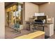 An outdoor kitchen and seating area for BBQ's and get togethers at 28754 N 107Th St, Scottsdale, AZ 85262