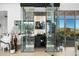 Elegant wine cellar with a glass enclosure, ample bottle storage, and stylish decor at 28754 N 107Th St, Scottsdale, AZ 85262