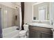 Well-lit bathroom featuring a shower-tub combo and modern vanity, ideal for everyday convenience at 29344 N 132Nd Ln, Peoria, AZ 85383