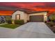 Attractive home featuring desert landscaping and an attached two-car garage in a well-maintained neighborhood at 29344 N 132Nd Ln, Peoria, AZ 85383