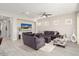 Spacious living room features recessed lighting, neutral decor, and wood-style flooring at 29344 N 132Nd Ln, Peoria, AZ 85383