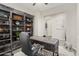 Versatile office featuring beautiful built-ins, ideal for a productive work-from-home environment at 29344 N 132Nd Ln, Peoria, AZ 85383
