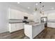 Spacious kitchen featuring an island, stainless steel appliances, and modern finishes at 2962 E Birdsong Ave, San Tan Valley, AZ 85143
