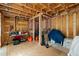 Unfinished basement with exposed framing, offering potential for customization and additional living space at 307 E Catalina Dr, Phoenix, AZ 85012