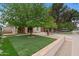 Charming home with lush front yard, artificial turf, and welcoming curb appeal at 307 E Catalina Dr, Phoenix, AZ 85012