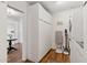 Well-organized laundry room with built-in cabinets and washer/dryer units at 307 E Catalina Dr, Phoenix, AZ 85012