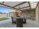 Inviting covered patio featuring stylish decor and comfortable seating at 307 E Catalina Dr, Phoenix, AZ 85012